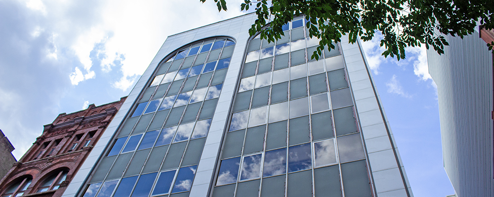 Looking up at a tall building